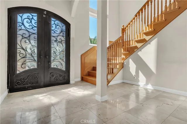 a view of entryway with wooden floor