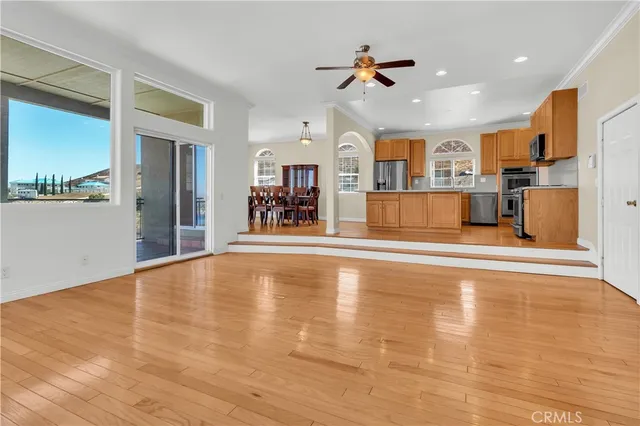 a view of a living room and kitchen