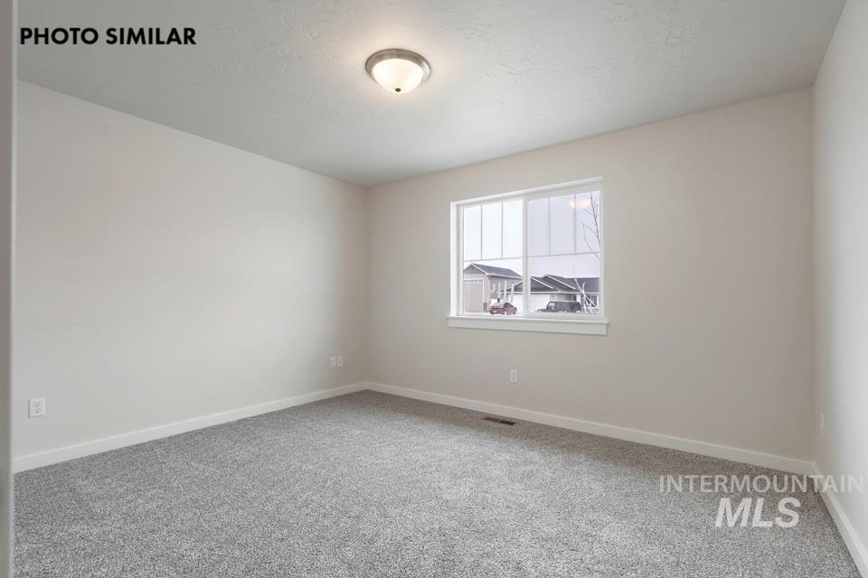 1645 Haystack Emmett, ID 83617 - Photo 22 of 33 Interior room featuring light gray carpeting and neutral wall paint