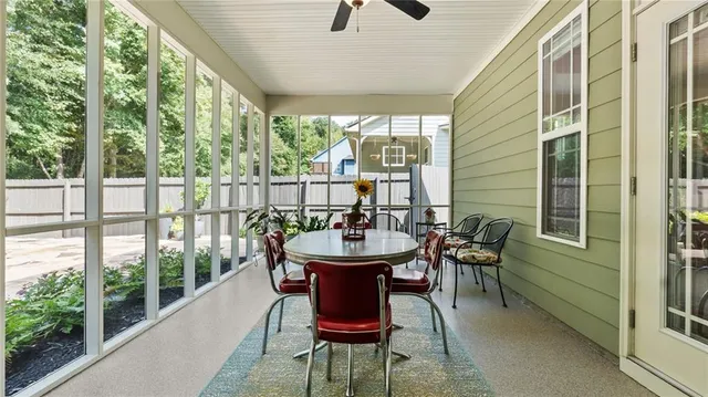 a dining room with furniture mountain view and a garden