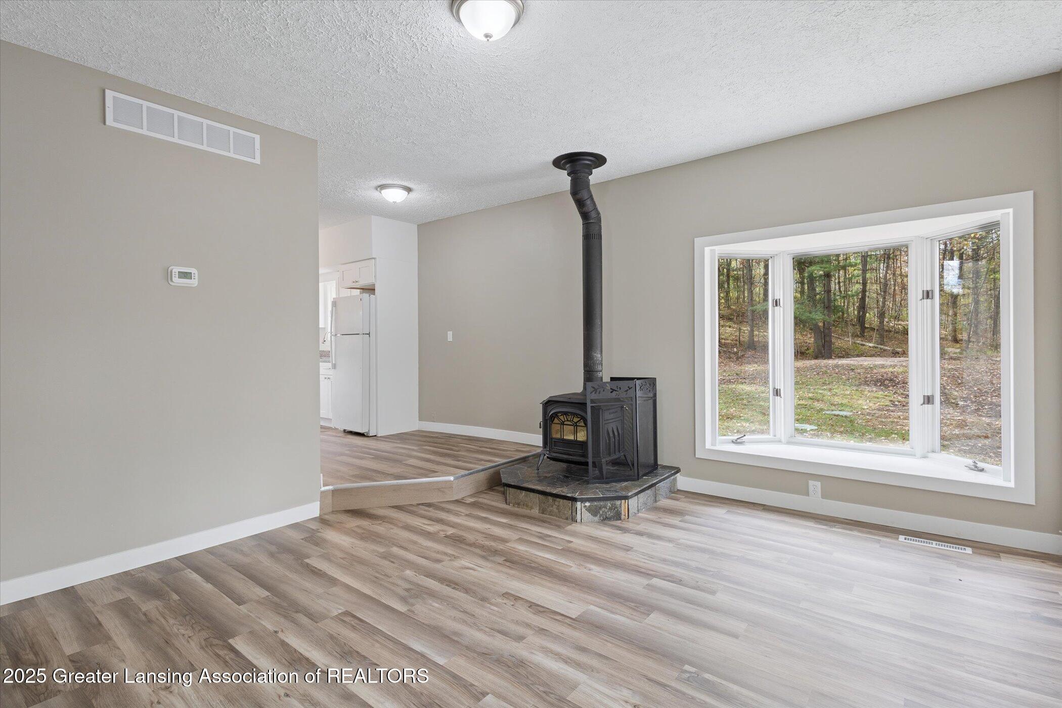 9595 East State Road Haslett, MI 48840 - Photo 10 of 47 08-9595-State-Rd-WindowStill-Photography