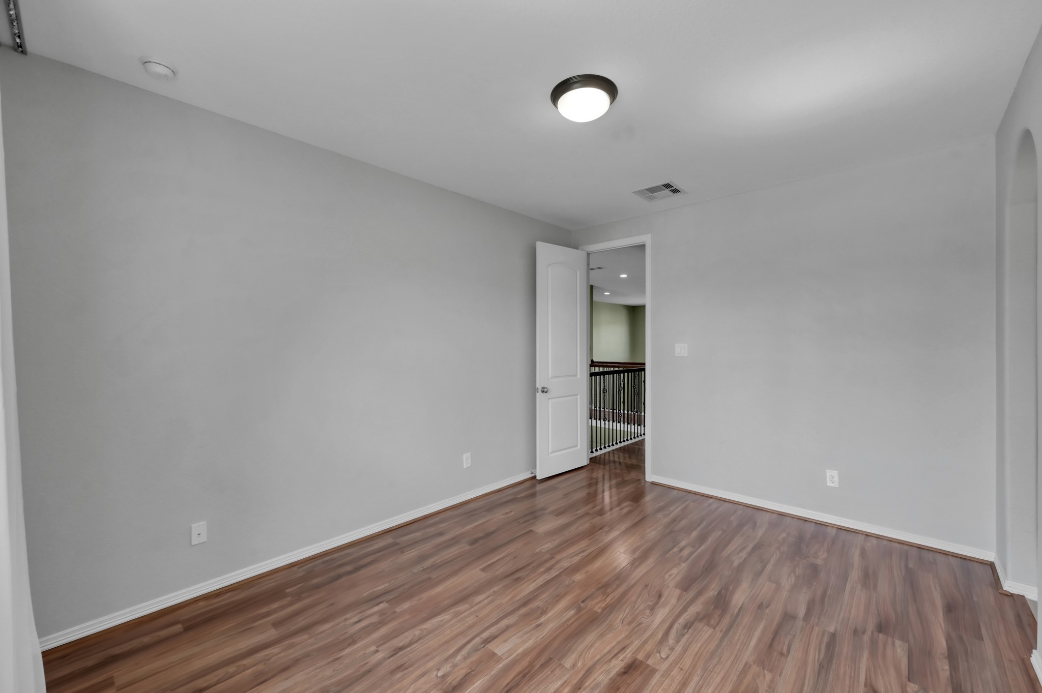 23219 Belted Kingfisher Trail Spring, TX 77389 - Photo 30 of 44 Tucked away upstairs for added privacy, Bedroom 5 includes a huge walk-in closet.