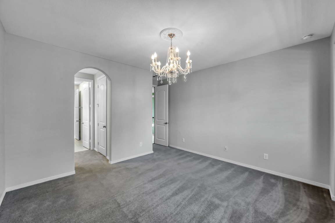 23219 Belted Kingfisher Trail Spring, TX 77389 - Photo 32 of 44 Bedroom 6 is privately situated upstairs. Another secondary bedroom with walk-in closet and private vanity space!