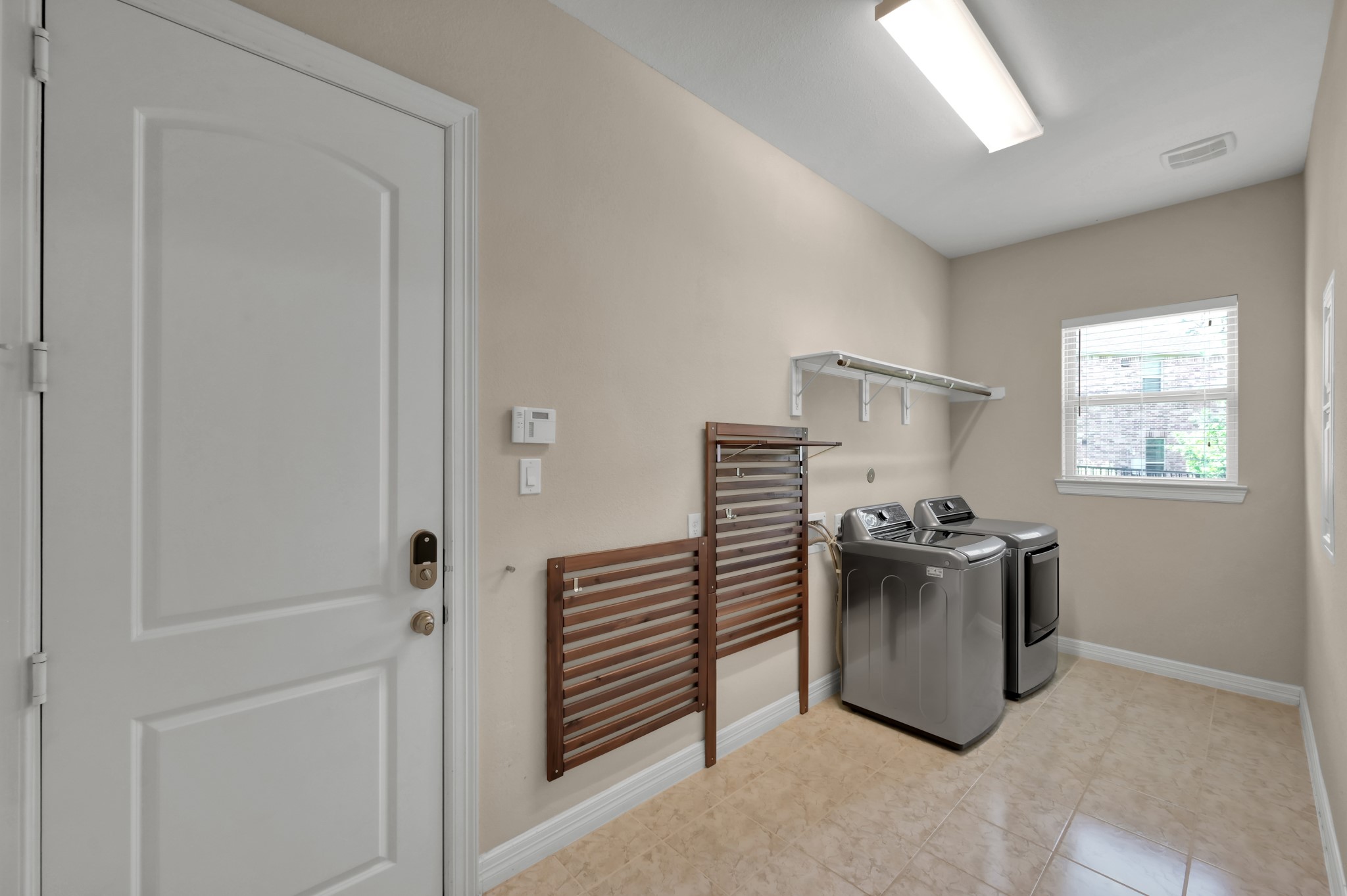 23219 Belted Kingfisher Trail Spring, TX 77389 - Photo 33 of 44 Huge laundry room with utility closet