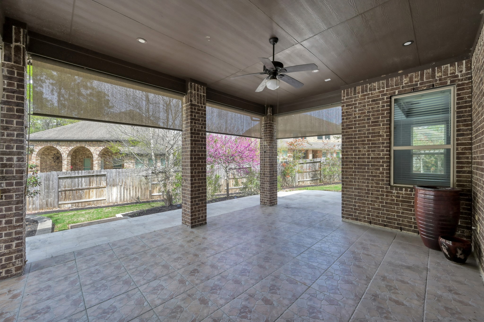 23219 Belted Kingfisher Trail Spring, TX 77389 - Photo 36 of 44 Large covered patio made for hosting friends and lingering long after