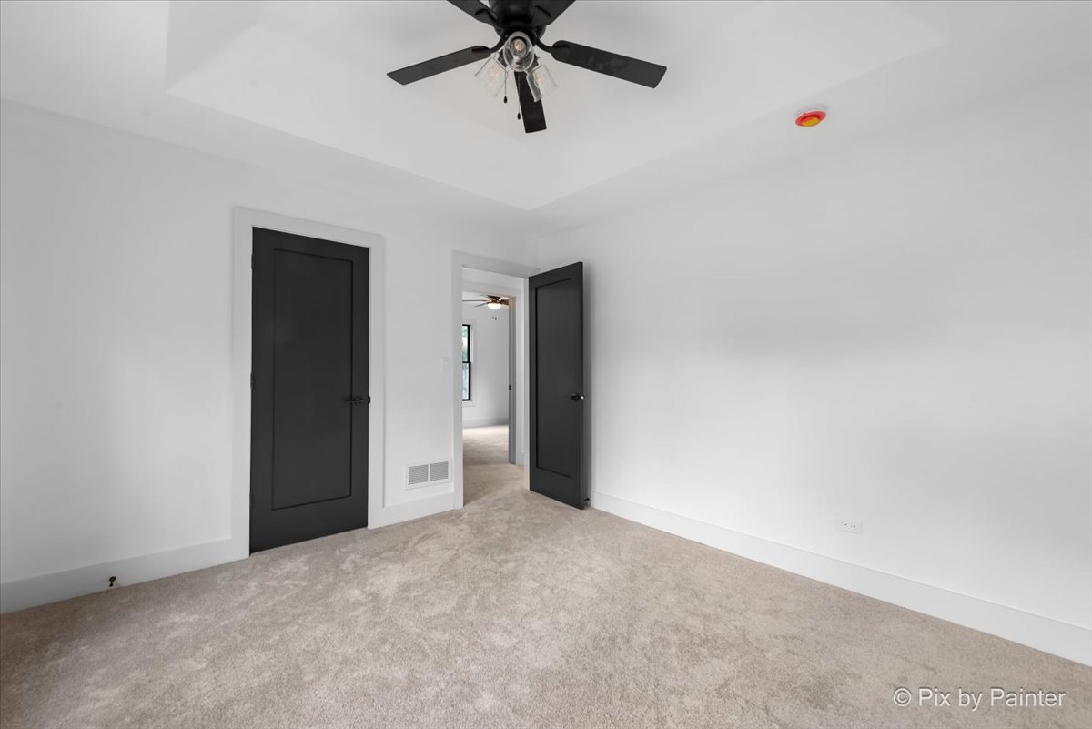 518 Illinois Street Geneva, IL 60134 - Photo 27 of 41 a view of a room with a ceiling fan