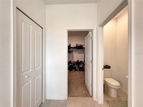 a bathroom with a bathtub and a shower curtain