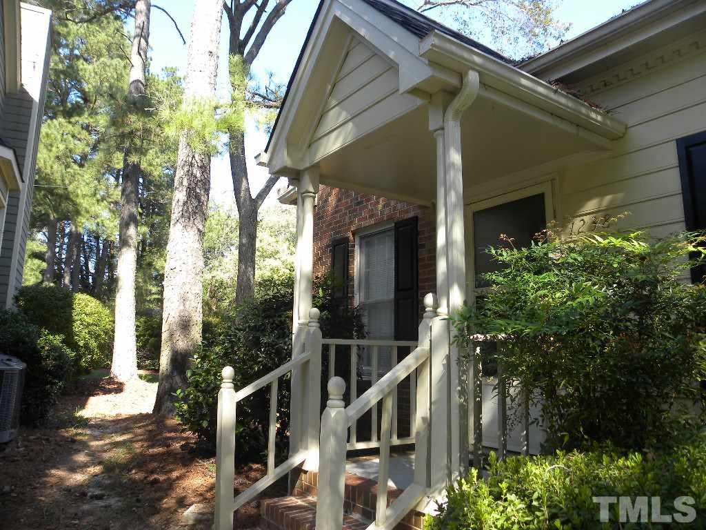 1238 Shadow Bark Court Raleigh, NC 27603 - Photo 2 of 17 a view of a house with a tree