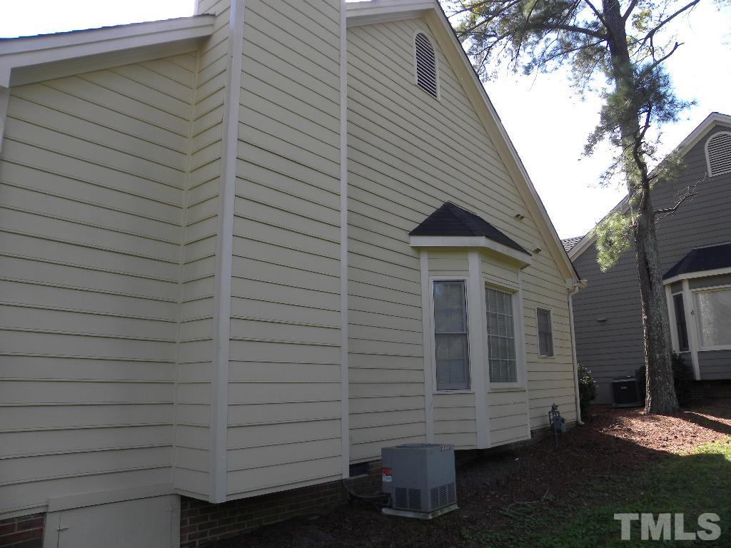 1238 Shadow Bark Court Raleigh, NC 27603 - Photo 15 of 17 a view of house with backyard