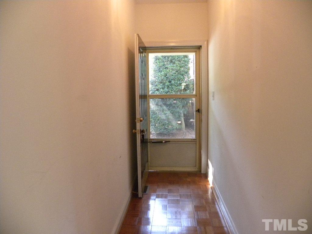 1238 Shadow Bark Court Raleigh, NC 27603 - Photo 3 of 17 a view of hallway with window