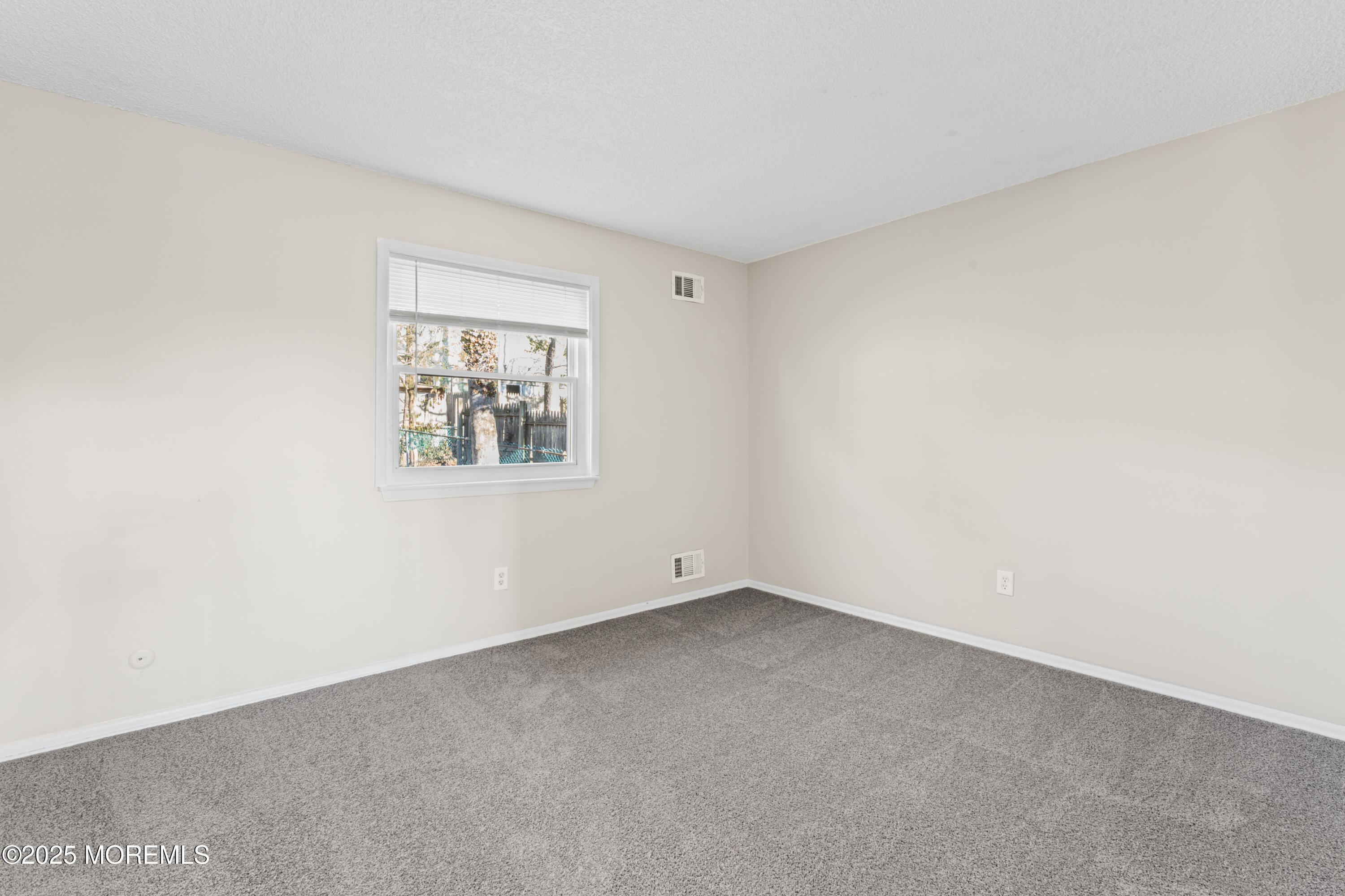 22 Anchor Road Barnegat, NJ 08005 - Photo 10 of 22 an empty room with a window
