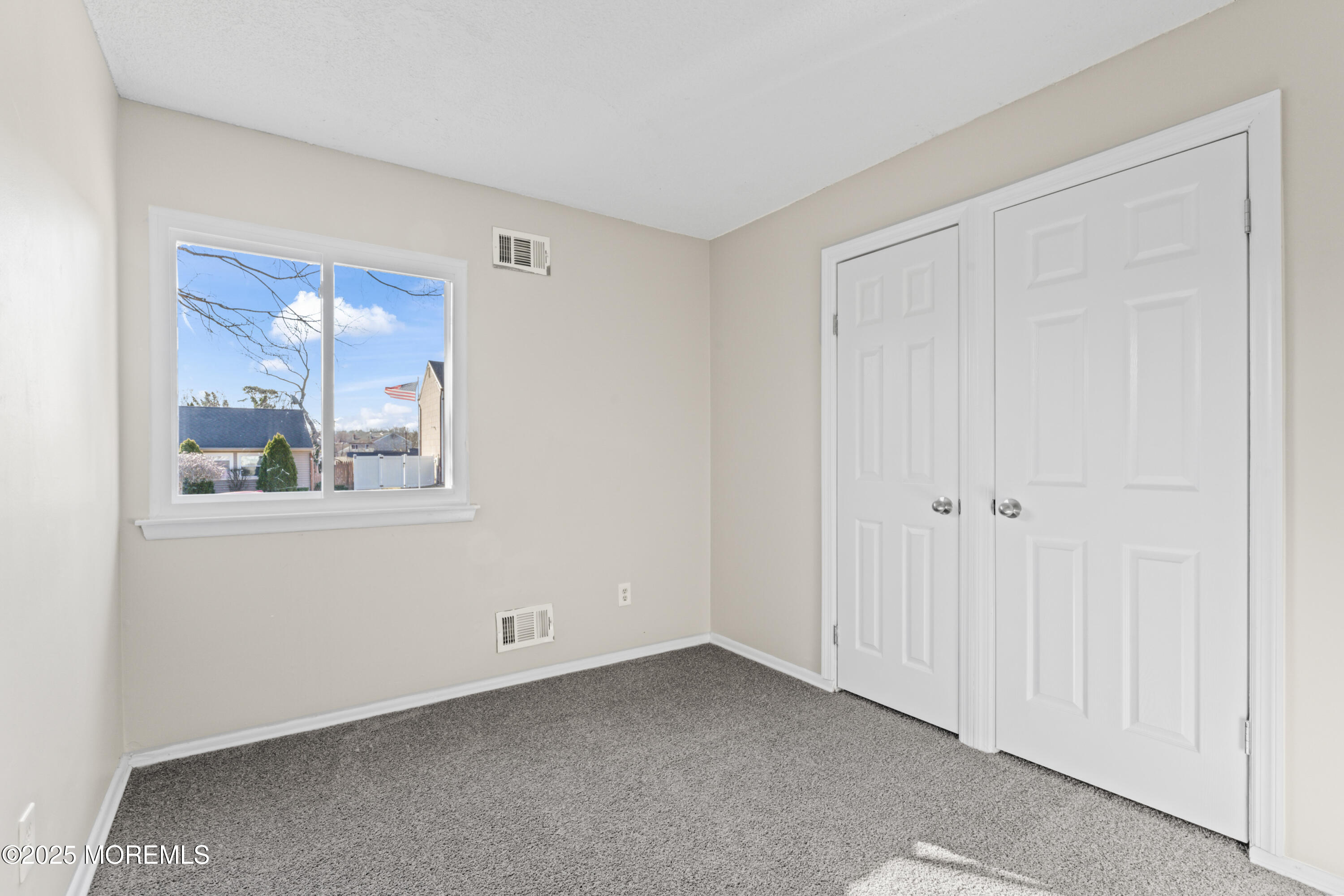 22 Anchor Road Barnegat, NJ 08005 - Photo 12 of 22 a view of an empty room with a window