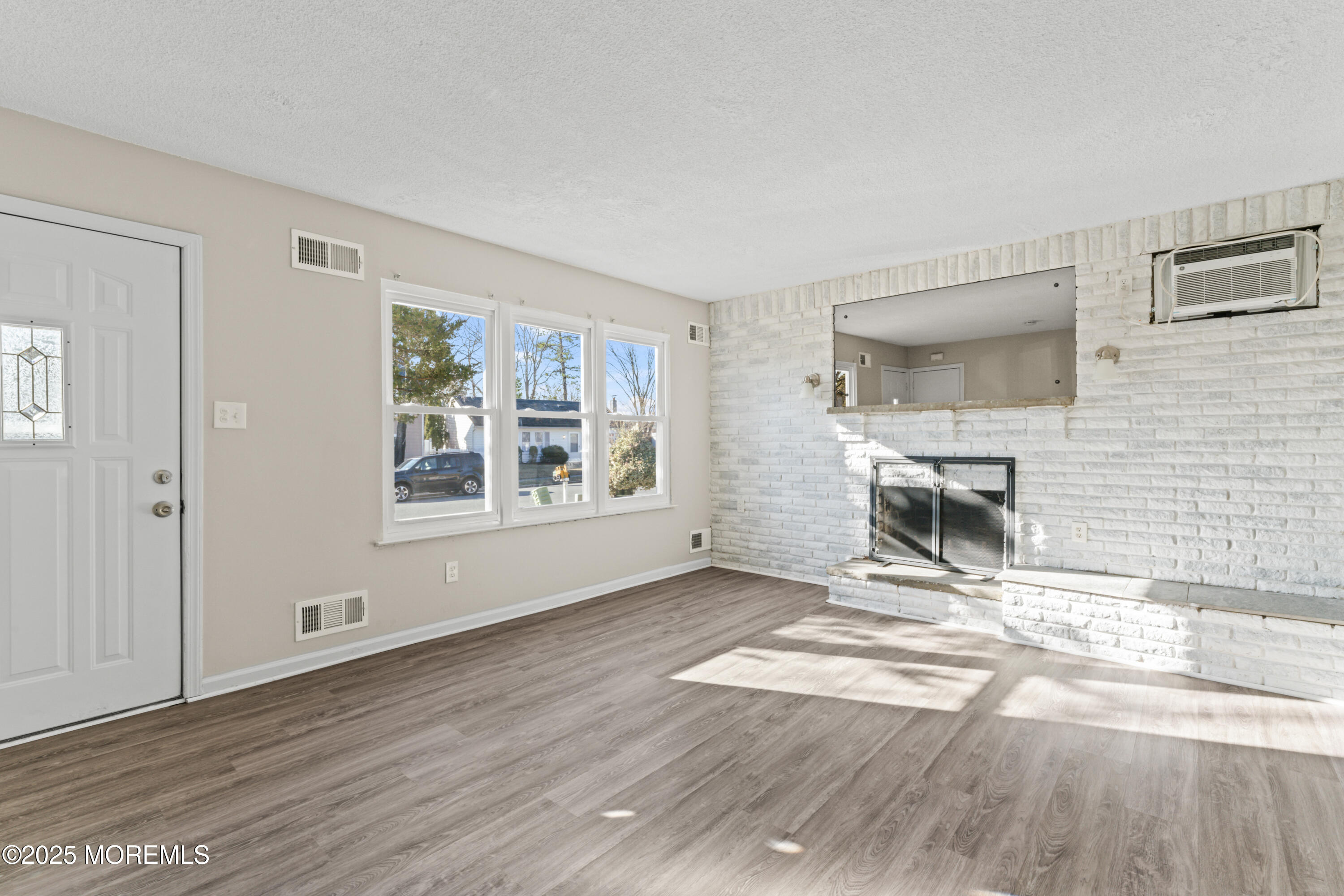 22 Anchor Road Barnegat, NJ 08005 - Photo 3 of 22 a view of work space with wooden floor and windows