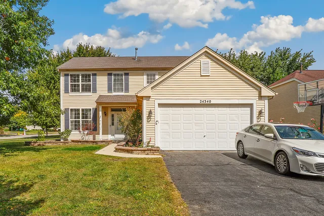 a view of a car in front of house