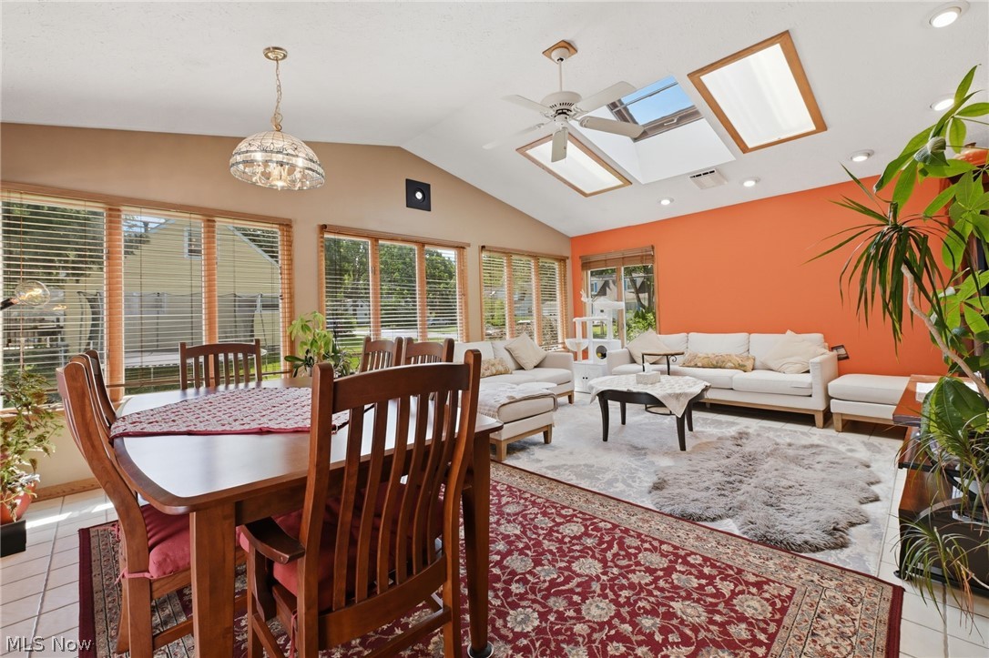 1499 Morris Road Kent, OH 44240 - Photo 17 of 41 Vaulted ceiling with multiple skylights and a ceiling fan