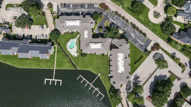 an aerial view of a house with a garden