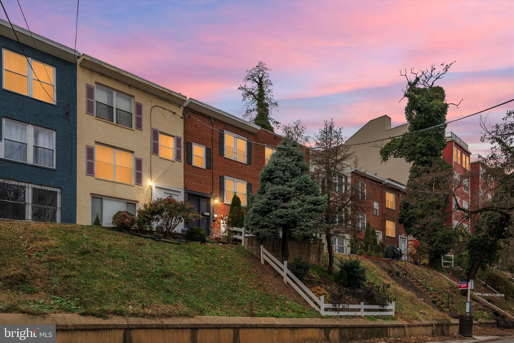 1353 Morris Road Southeast Washington, DC 20020 - Photo 1 of 32 a front view of a house with garden