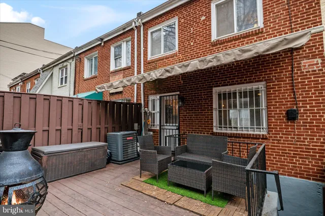 a view of a deck with furniture