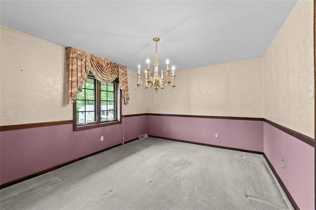 4948 Ashbaugh Road Murrysville, PA 15668 - Photo 12 of 48 Chair rail in Dining Room