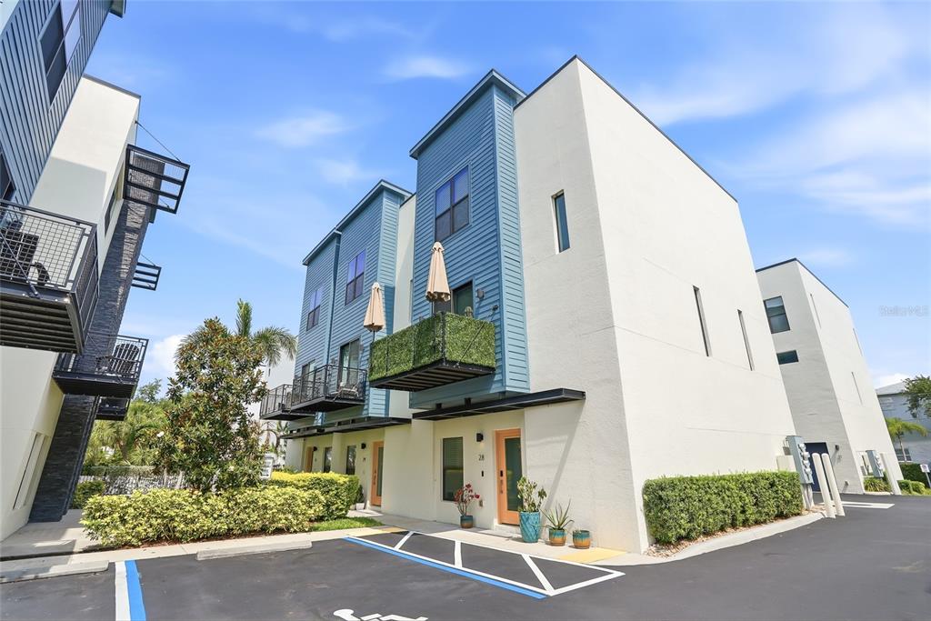 4810 West McElroy Avenue, Unit 30 Tampa, FL 33611 - Photo 33 of 43 a front view of a house with a street