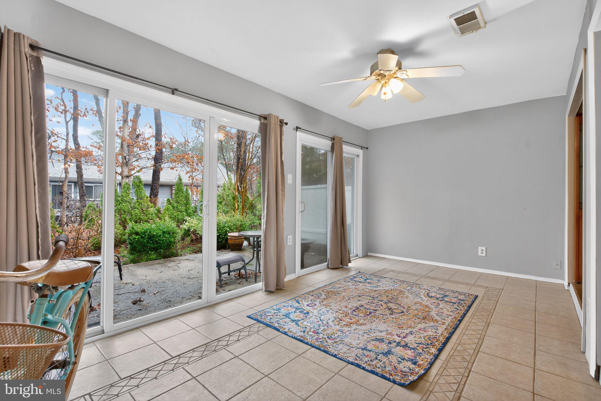 22 Club Place Absecon, NJ 08205 - Photo 14 of 37 a view of an entryway with a chandelier