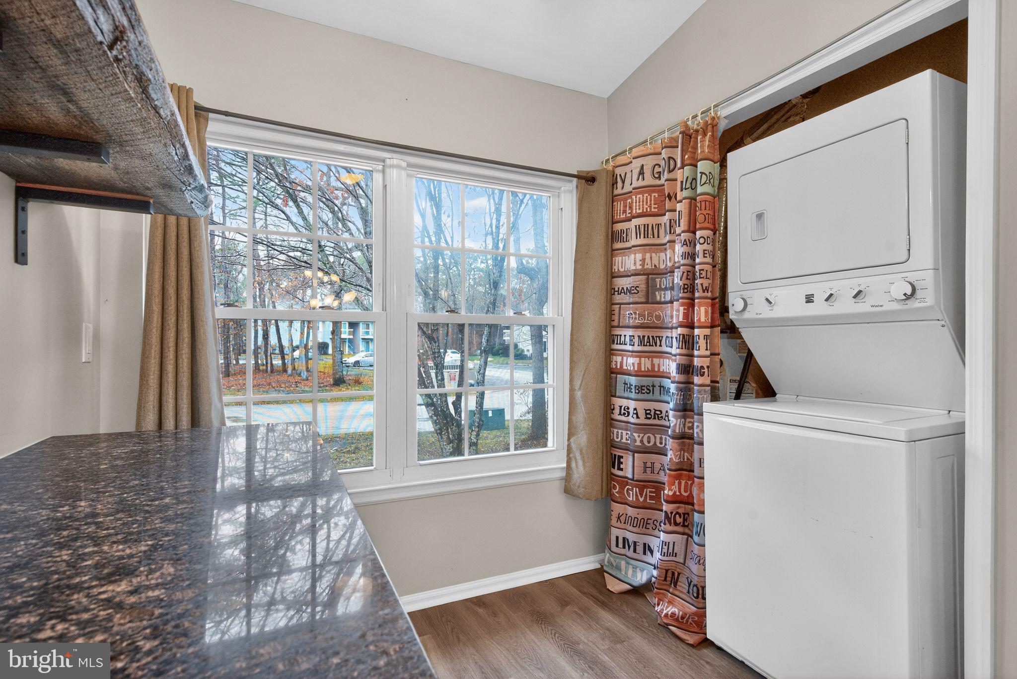 22 Club Place Absecon, NJ 08205 - Photo 25 of 37 a room with a wooden floor and a large window