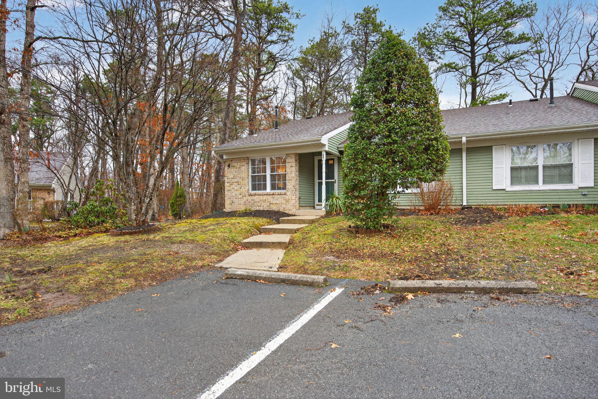 22 Club Place Absecon, NJ 08205 - Photo 29 of 37 front view of a house with a yard