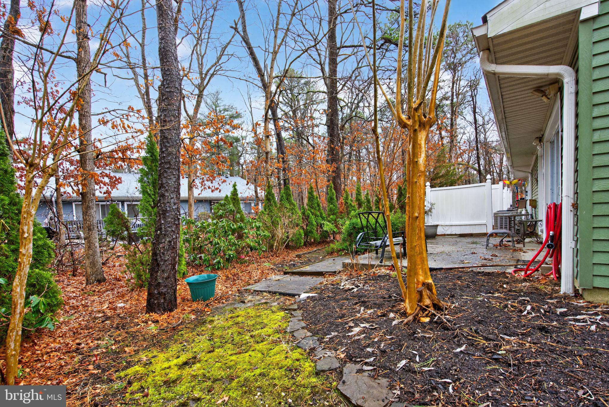22 Club Place Absecon, NJ 08205 - Photo 32 of 37 a backyard of a house with lots of green space