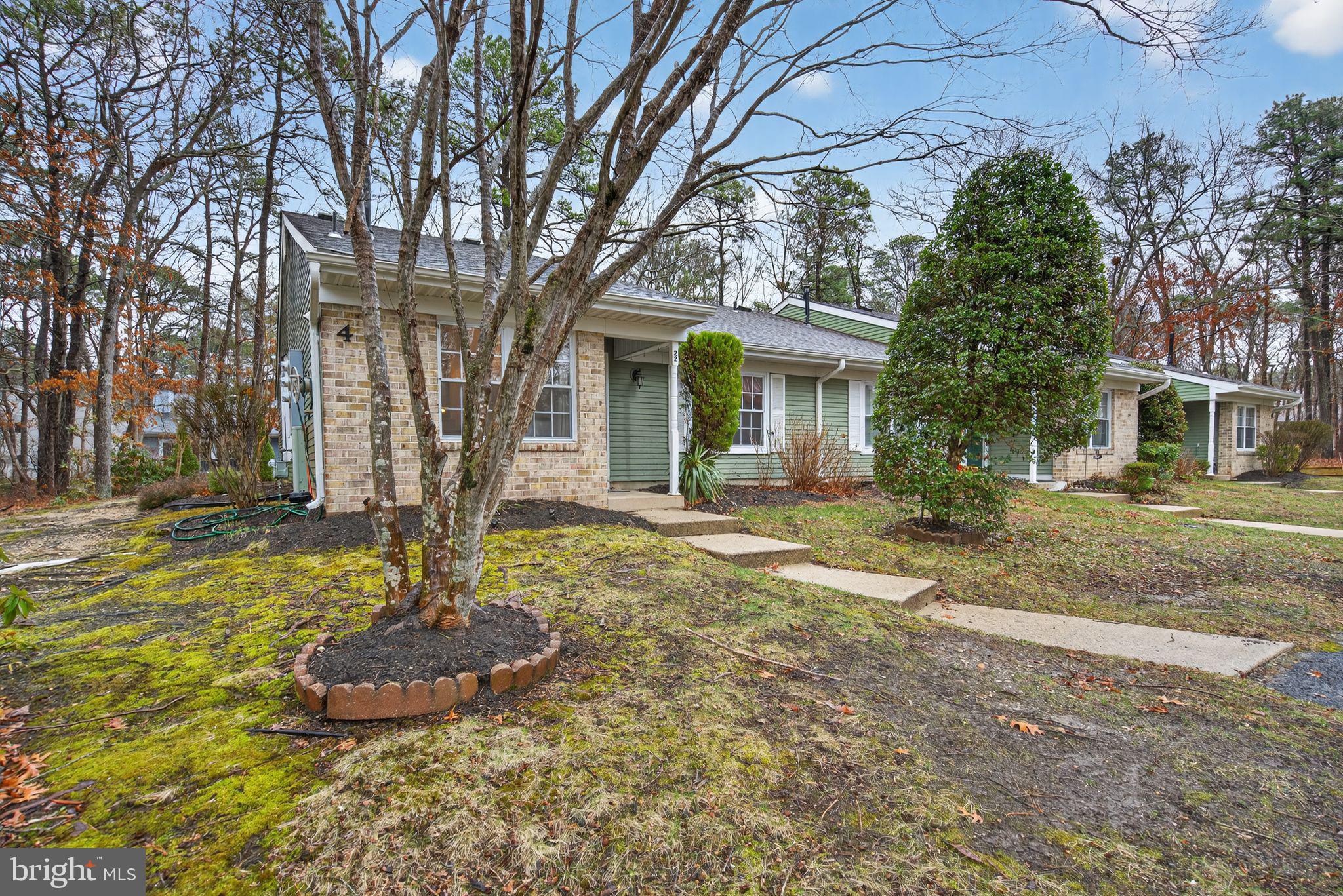 22 Club Place Absecon, NJ 08205 - Photo 33 of 37 a front view of a house with a yard