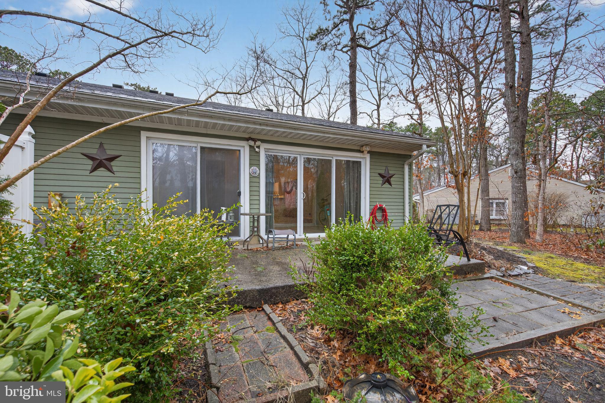 22 Club Place Absecon, NJ 08205 - Photo 34 of 37 two front view of a house with garden