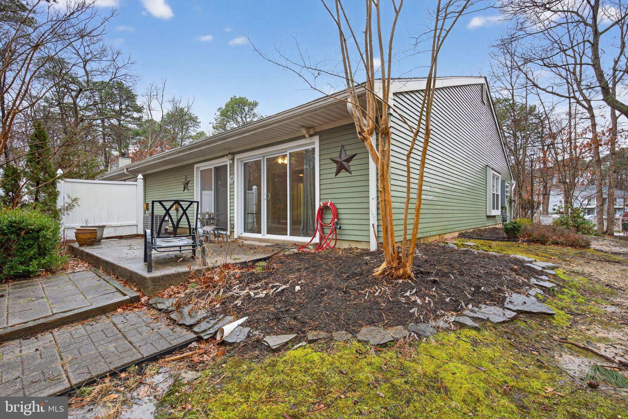 22 Club Place Absecon, NJ 08205 - Photo 35 of 37 a view of a house with backyard and porch