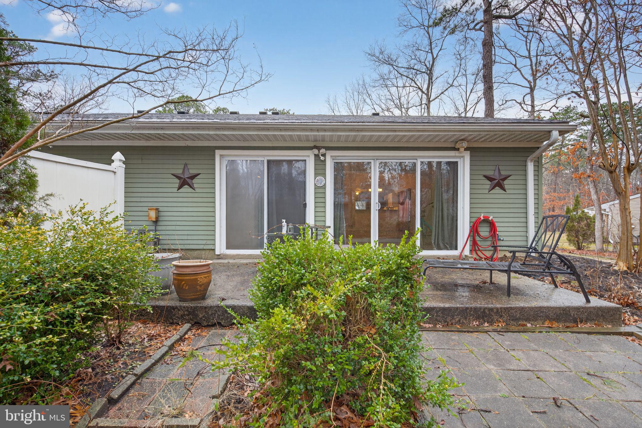 22 Club Place Absecon, NJ 08205 - Photo 36 of 37 front view of a house with a porch
