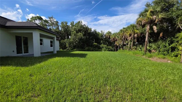 a house view with a garden space