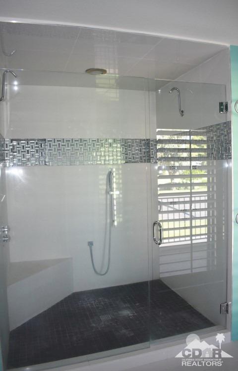6243 East Driver Road Palm Springs, CA 92264 - Photo 11 of 14 a view of a room with rack on the wall and a window