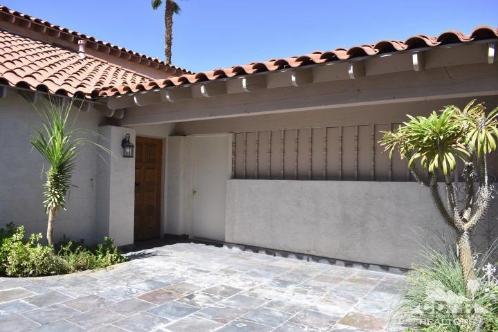 6243 East Driver Road Palm Springs, CA 92264 - Photo 14 of 14 a front view of a house with plants