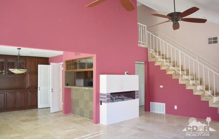 6243 East Driver Road Palm Springs, CA 92264 - Photo 3 of 14 a view of entryway and hall with a living room