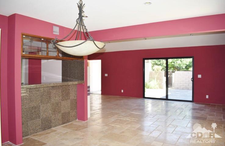 6243 East Driver Road Palm Springs, CA 92264 - Photo 5 of 14 a view of a room with a chandelier and living room