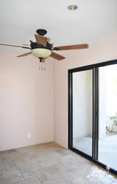 6243 East Driver Road Palm Springs, CA 92264 - Photo 9 of 14 a view of a room with a fan and a window