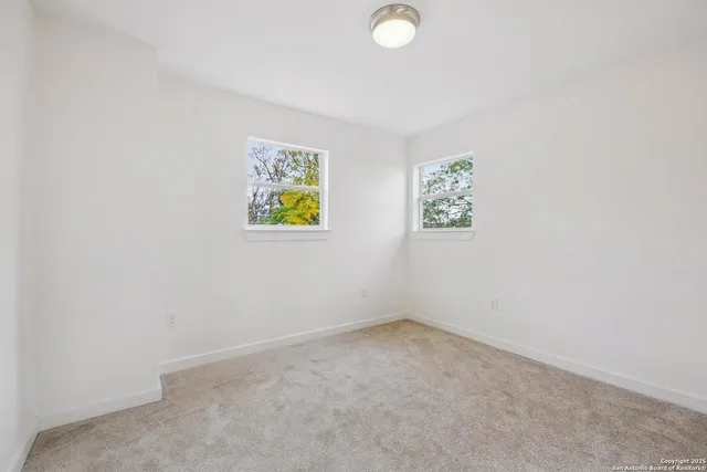 an empty room with window