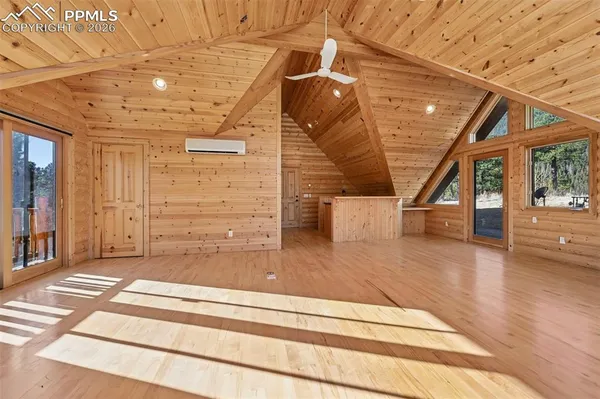 a view of outdoor space with wooden floor and deck