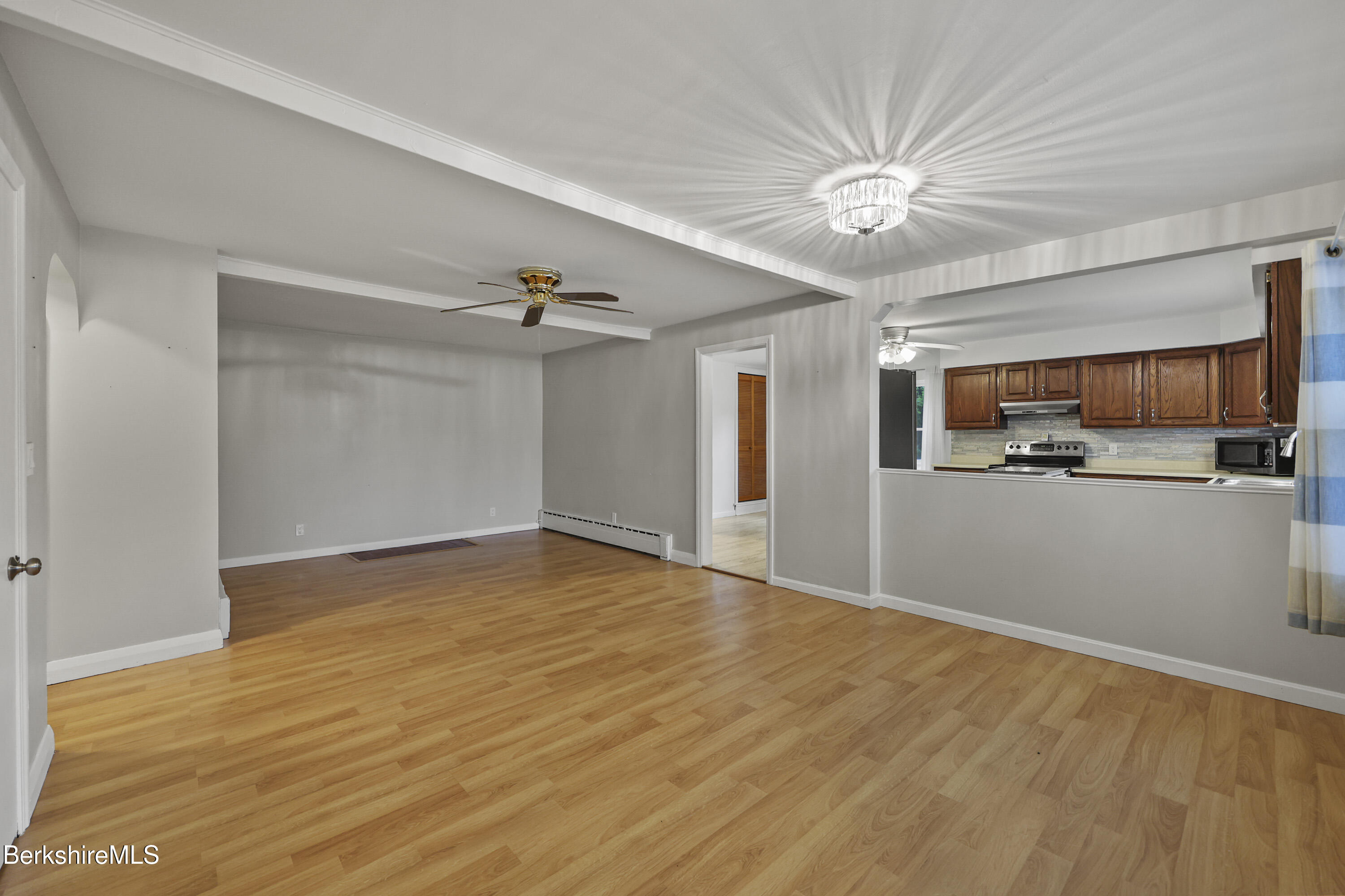 41 Deming Street Dalton, MA 01226 - Photo 11 of 35 a view of a kitchen with a sink and a refrigerator