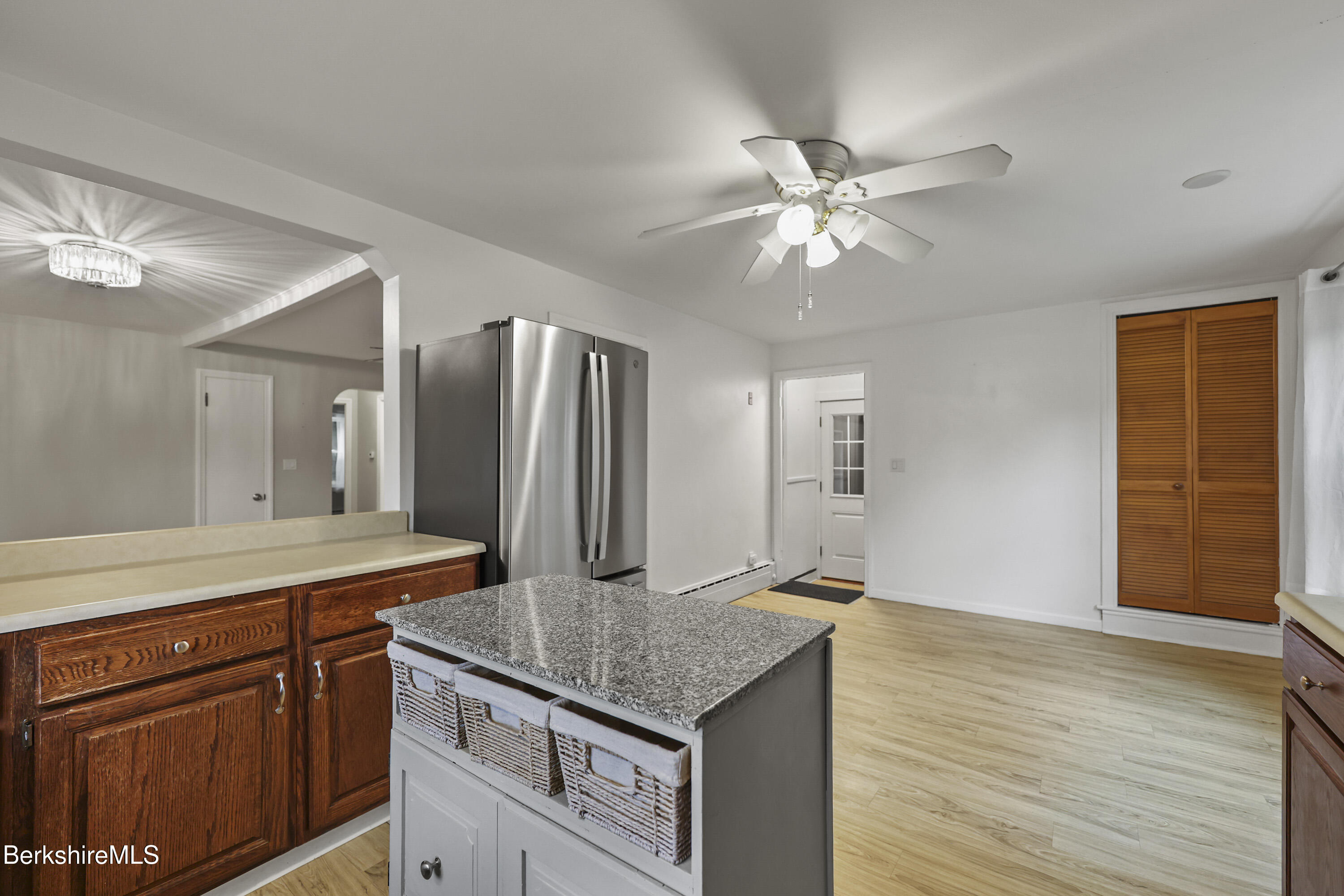 41 Deming Street Dalton, MA 01226 - Photo 15 of 35 a bathroom with a granite countertop sink and a mirror
