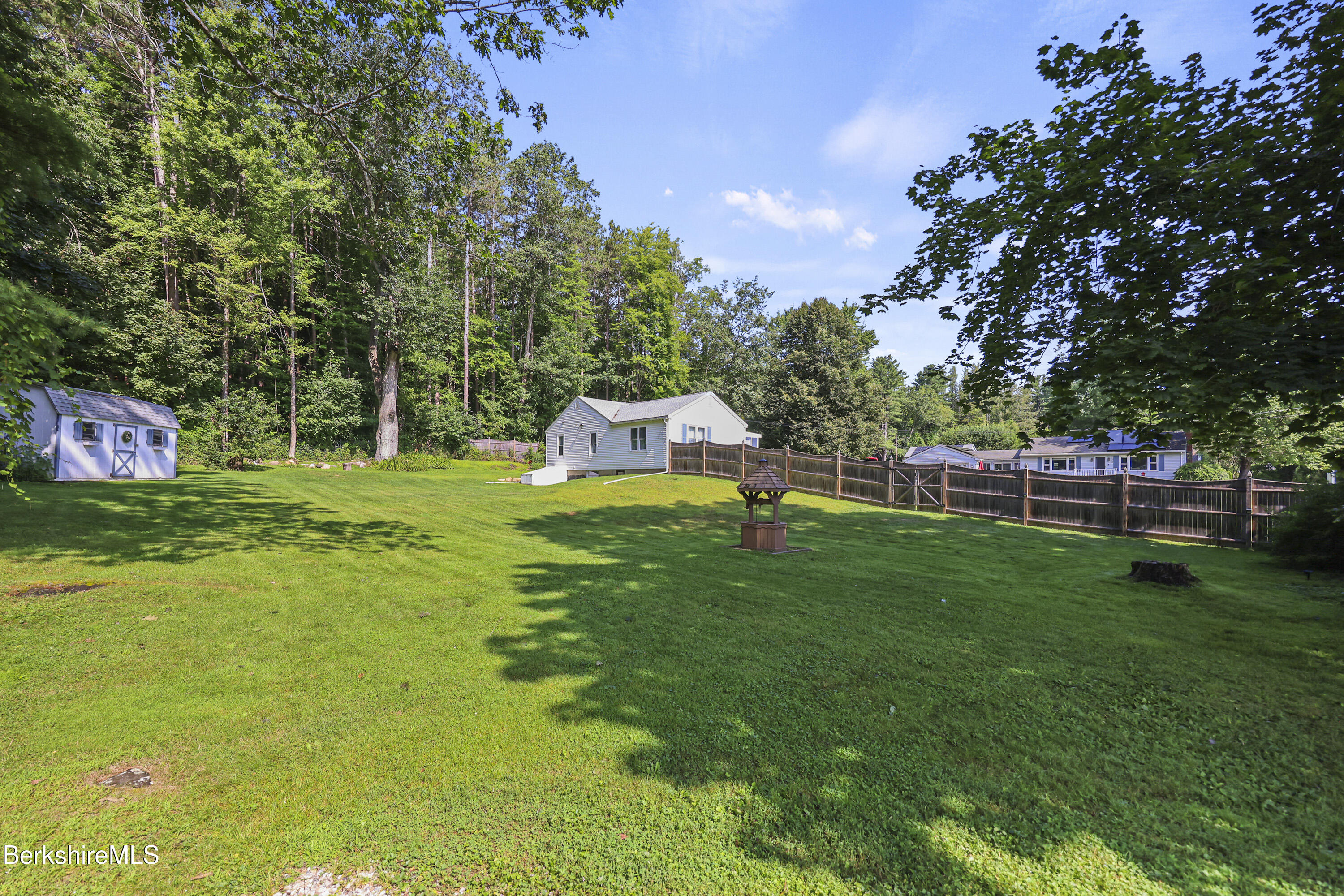 41 Deming Street Dalton, MA 01226 - Photo 33 of 35 a view of a golf course with a lake