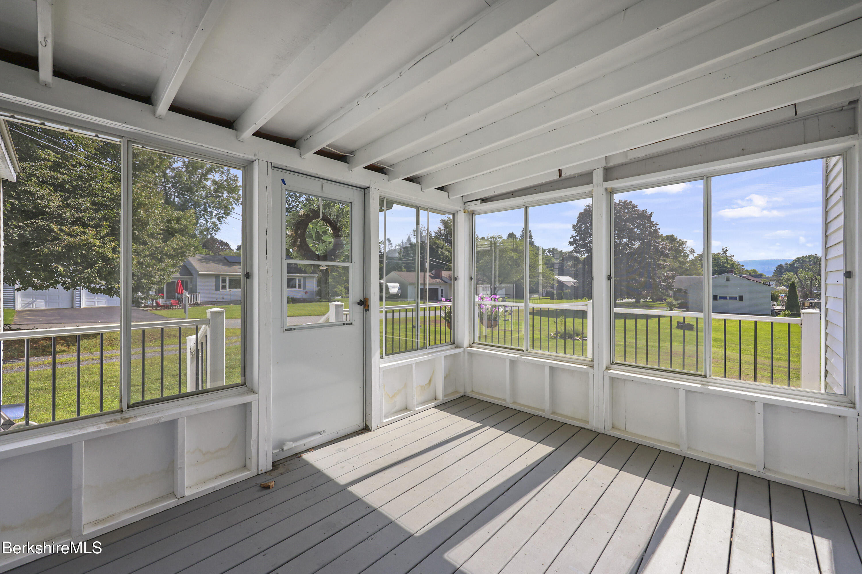41 Deming Street Dalton, MA 01226 - Photo 6 of 35 a view of a balcony with wooden floor