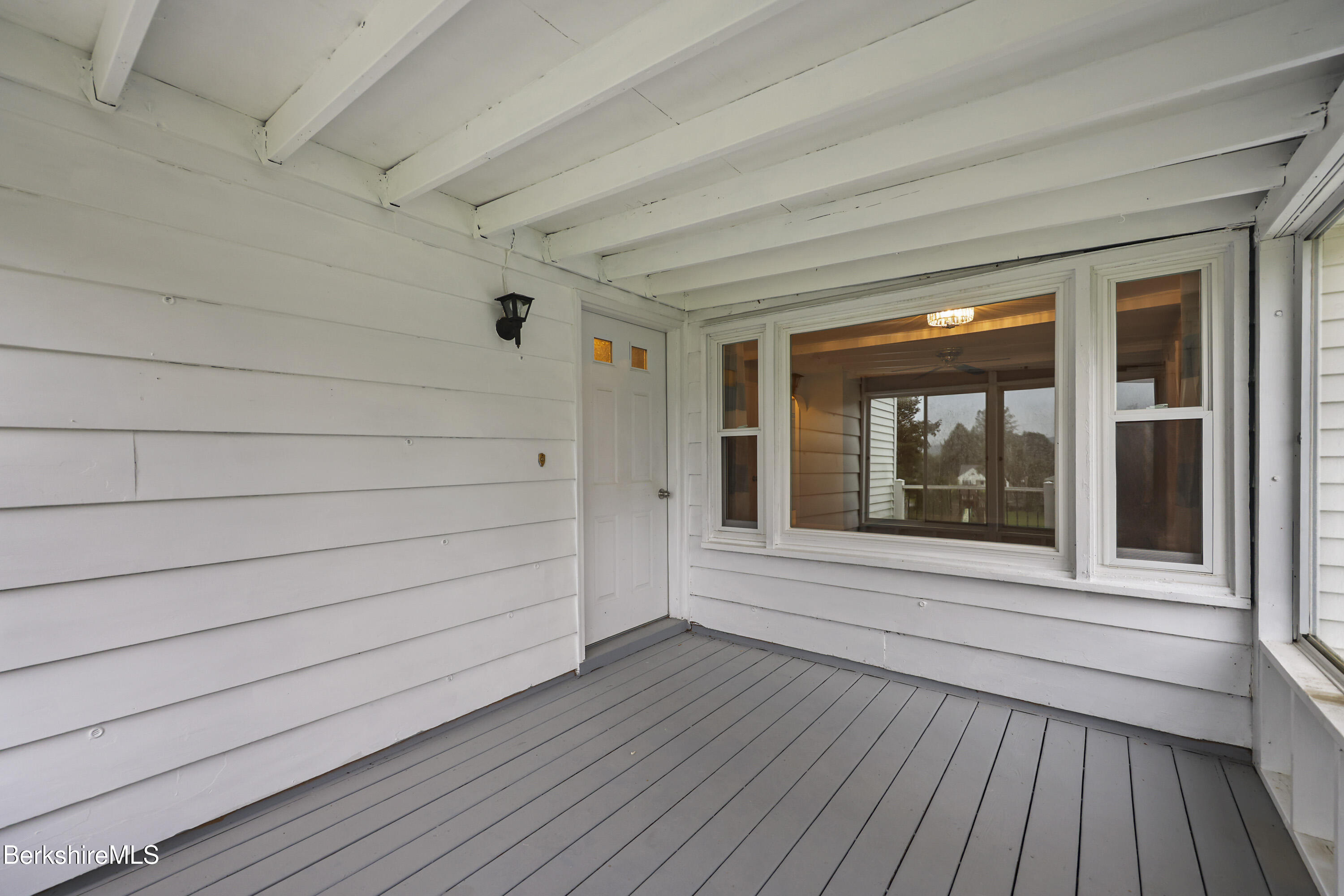 41 Deming Street Dalton, MA 01226 - Photo 7 of 35 a view of front door and deck of the house