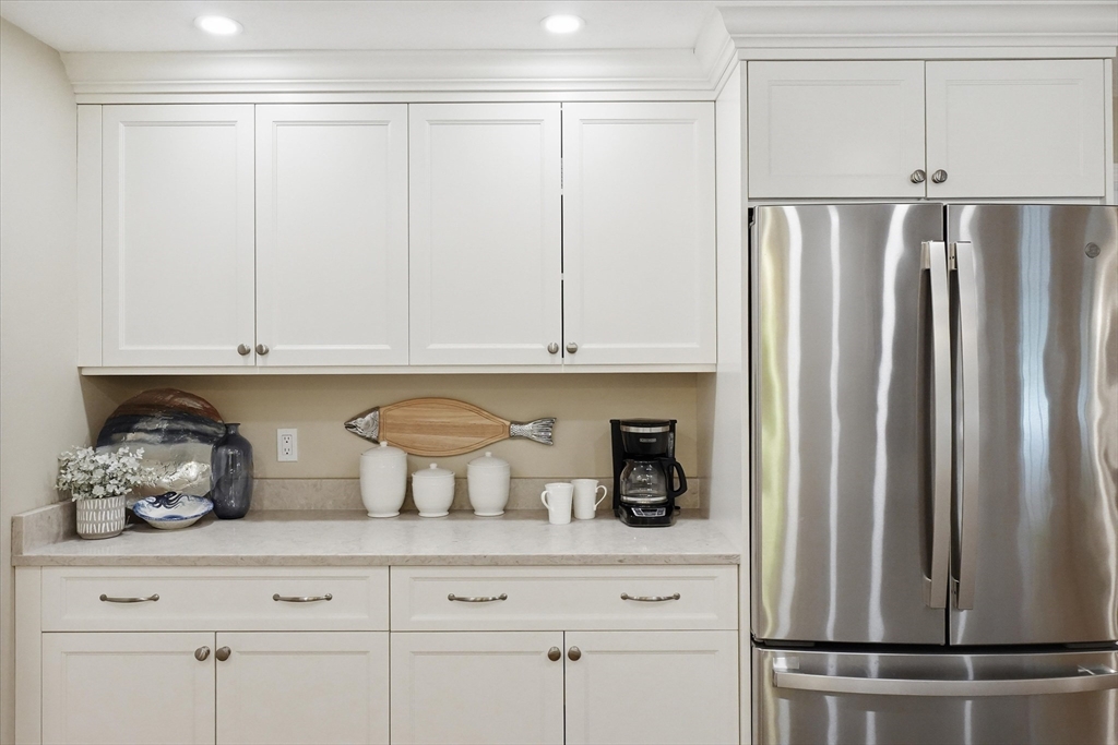 9 Fazio Farm Road Georgetown, MA 01833 - Photo 8 of 42 a kitchen with appliances cabinets and a window