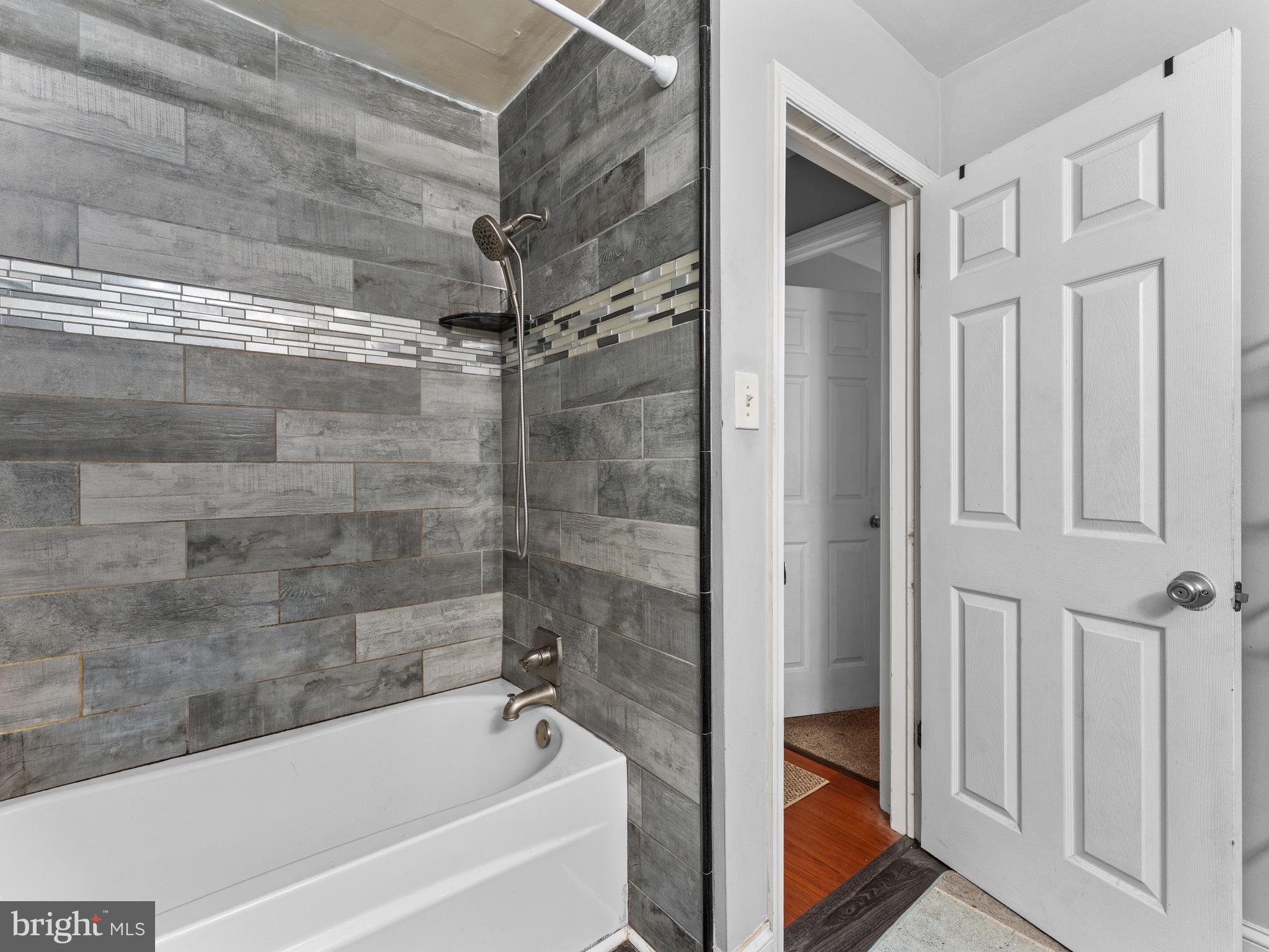 21 Maynard Drive Sicklerville, NJ 08081 - Photo 16 of 23 a bathroom with a bathtub and a shower