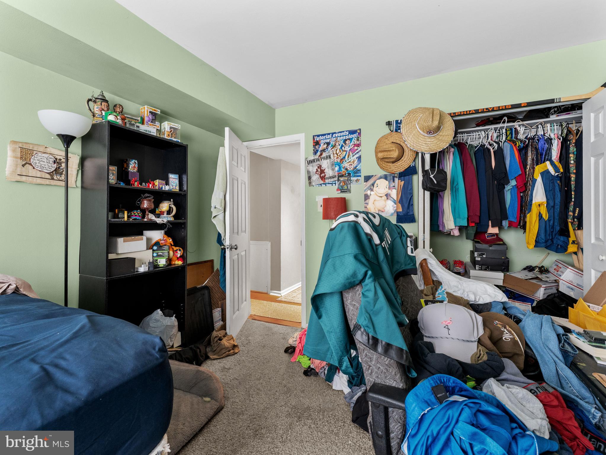 21 Maynard Drive Sicklerville, NJ 08081 - Photo 19 of 23 a view of walk in closet with clothes and shoes