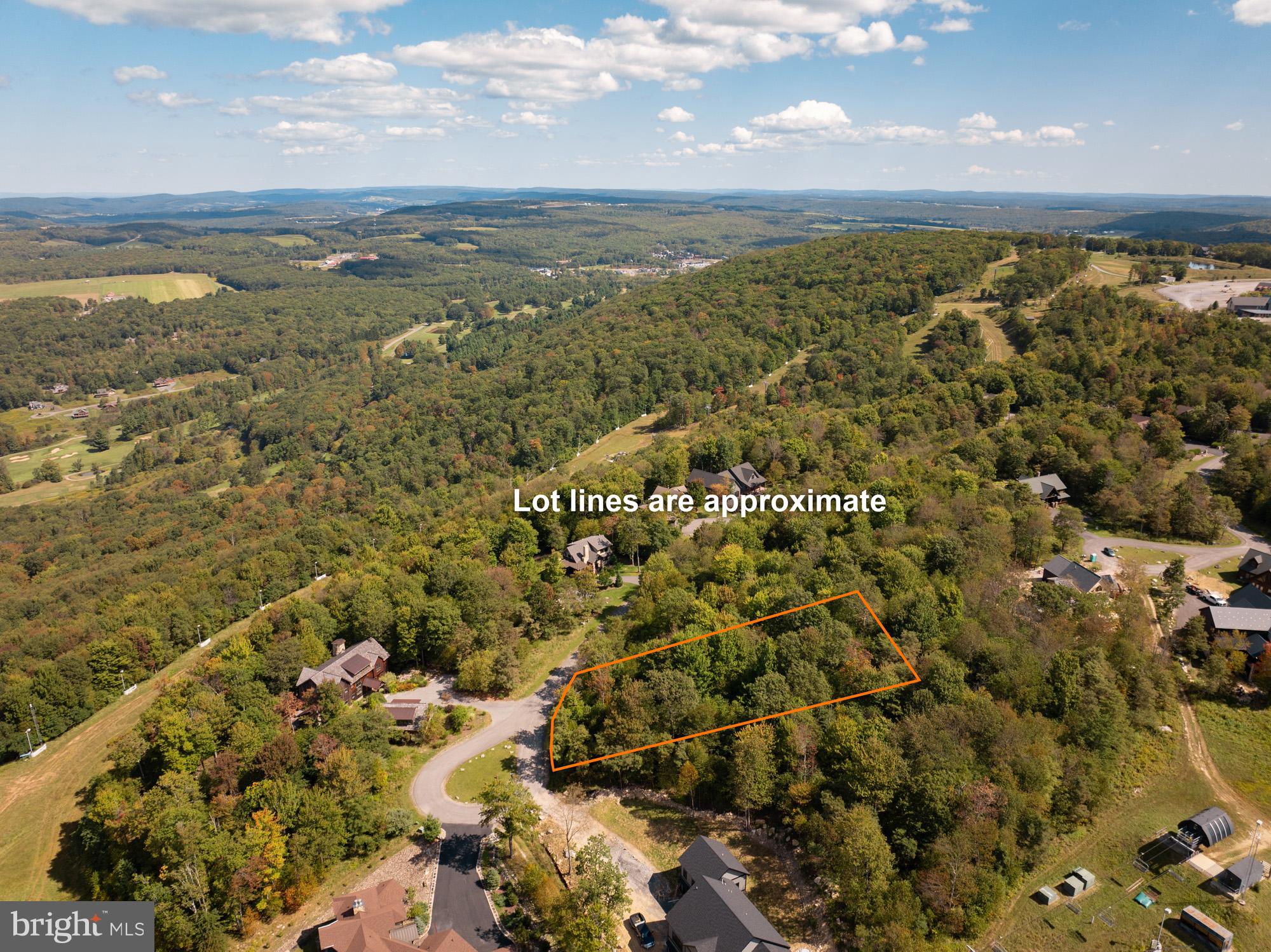 a view of an ocean and mountain