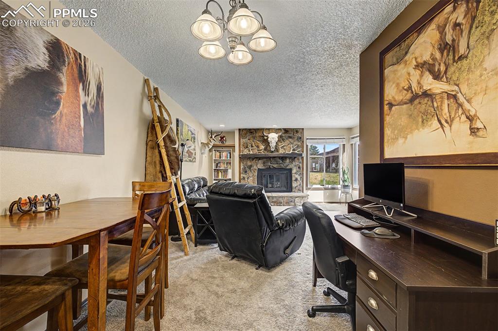 1140 Magic Lamp Way, Unit 3 Monument, CO 80132 - Photo 10 of 23 a view of a workspace with furniture